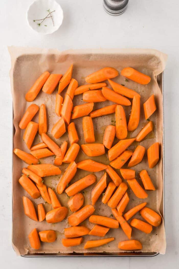 Baking carrots on parchment-lined baking sheets