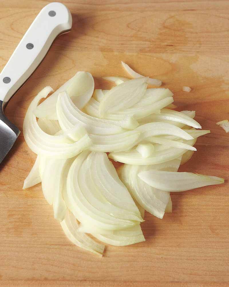 The Method Of Slicing Onions For Fajitas
